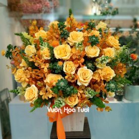 Lẵng hoa chúc mừng hồng vàng mix lan Mokara