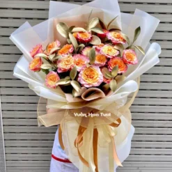 Bó Hoa Hồng Cam Spirit Lá Gold