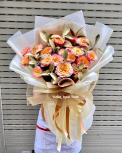 Bó Hoa Hồng Cam Spirit Lá Gold