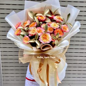 Bó Hoa Hồng Cam Spirit Lá Gold