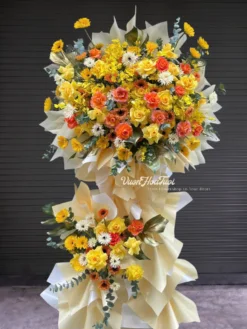 Rực rỡ cùng Kệ Hoa Khai Trương Phát Lộc Thịnh Vượng mix hồng vàng, lan vũ nữ và lá xịt gold tặng khai trương. Vườn Hoa Tươi giao nhanh HCM. Đặt ngay!